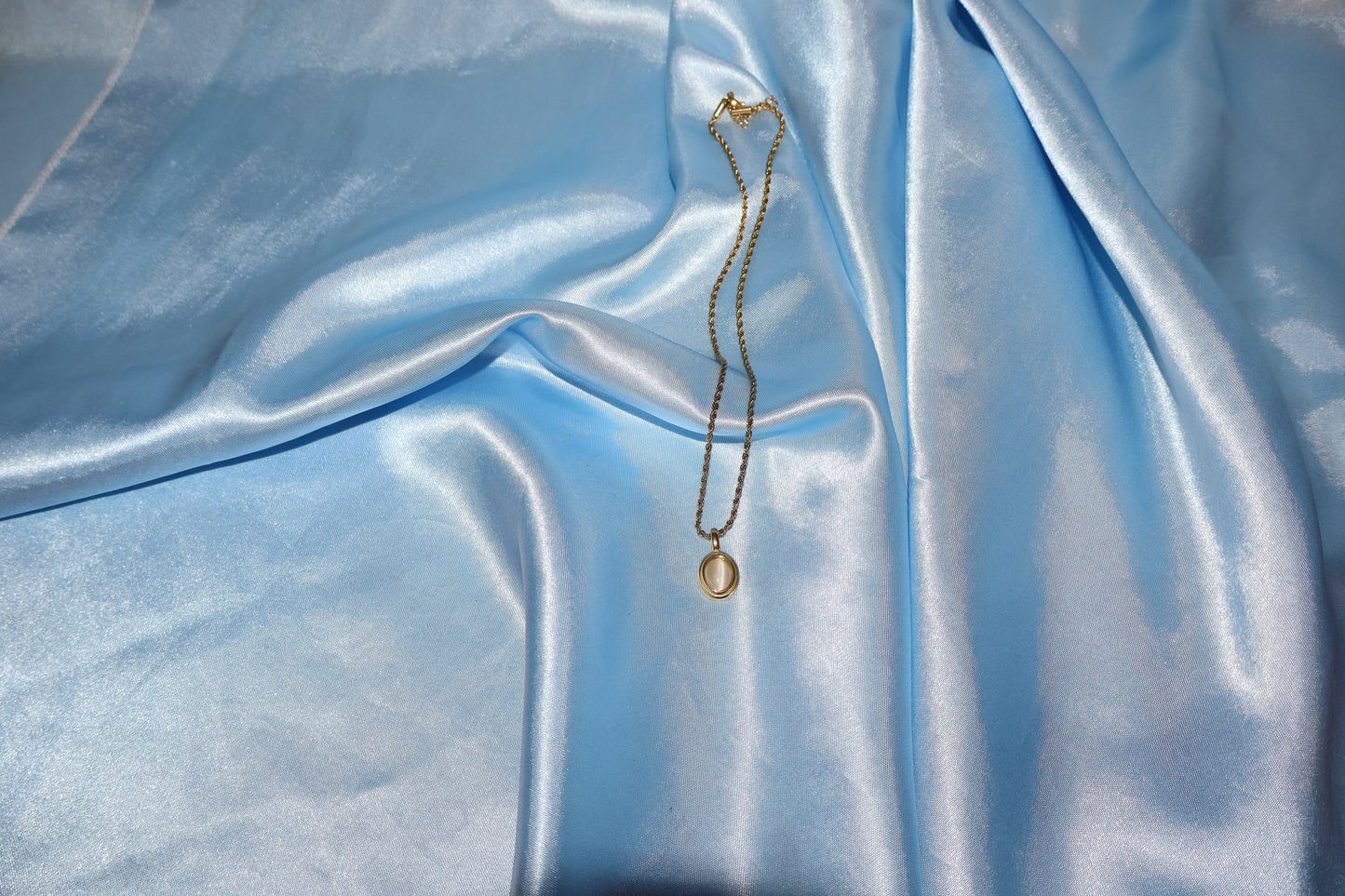 white stone pendant gold necklace