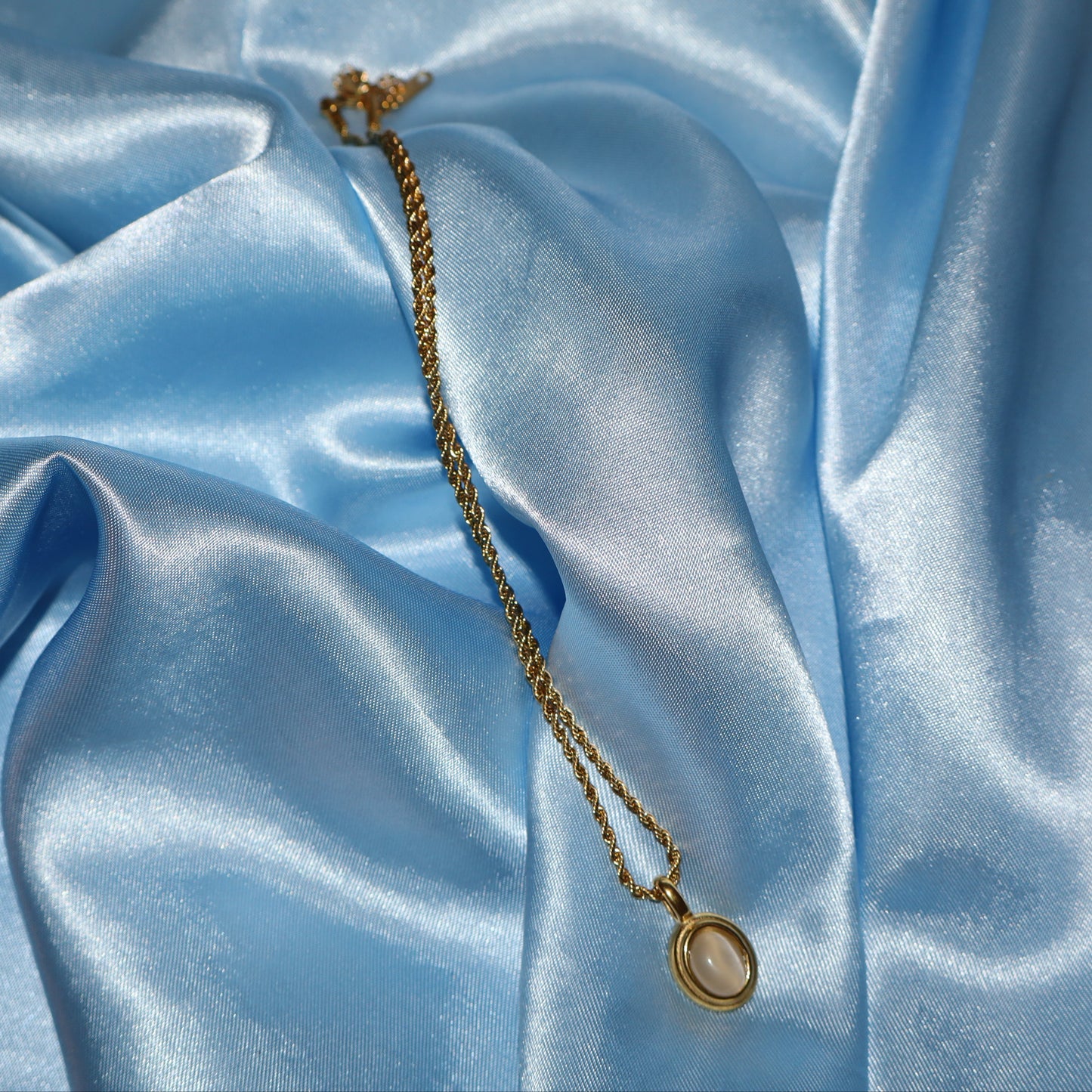 white stone pendant gold necklace