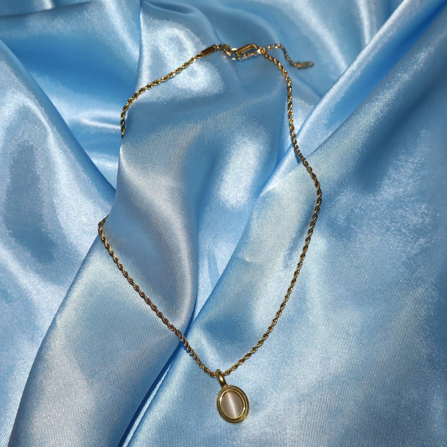 white stone pendant gold necklace