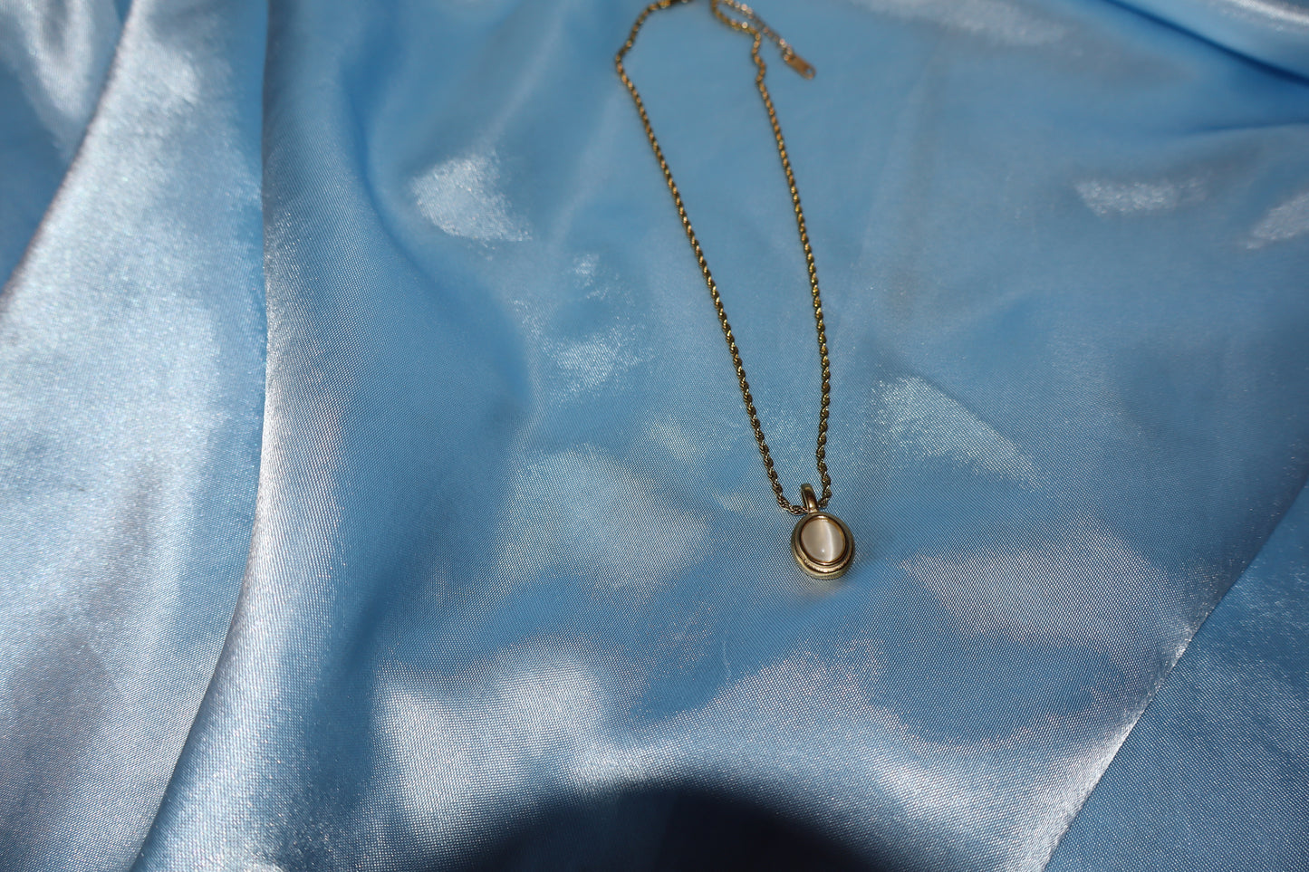 white stone pendant gold necklace