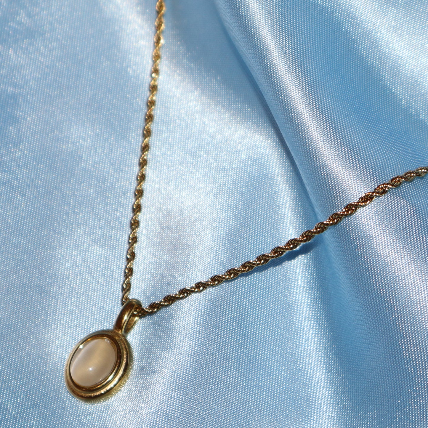 white stone pendant gold necklace