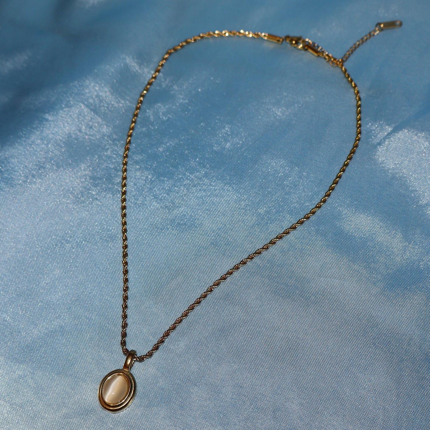 white stone pendant gold necklace