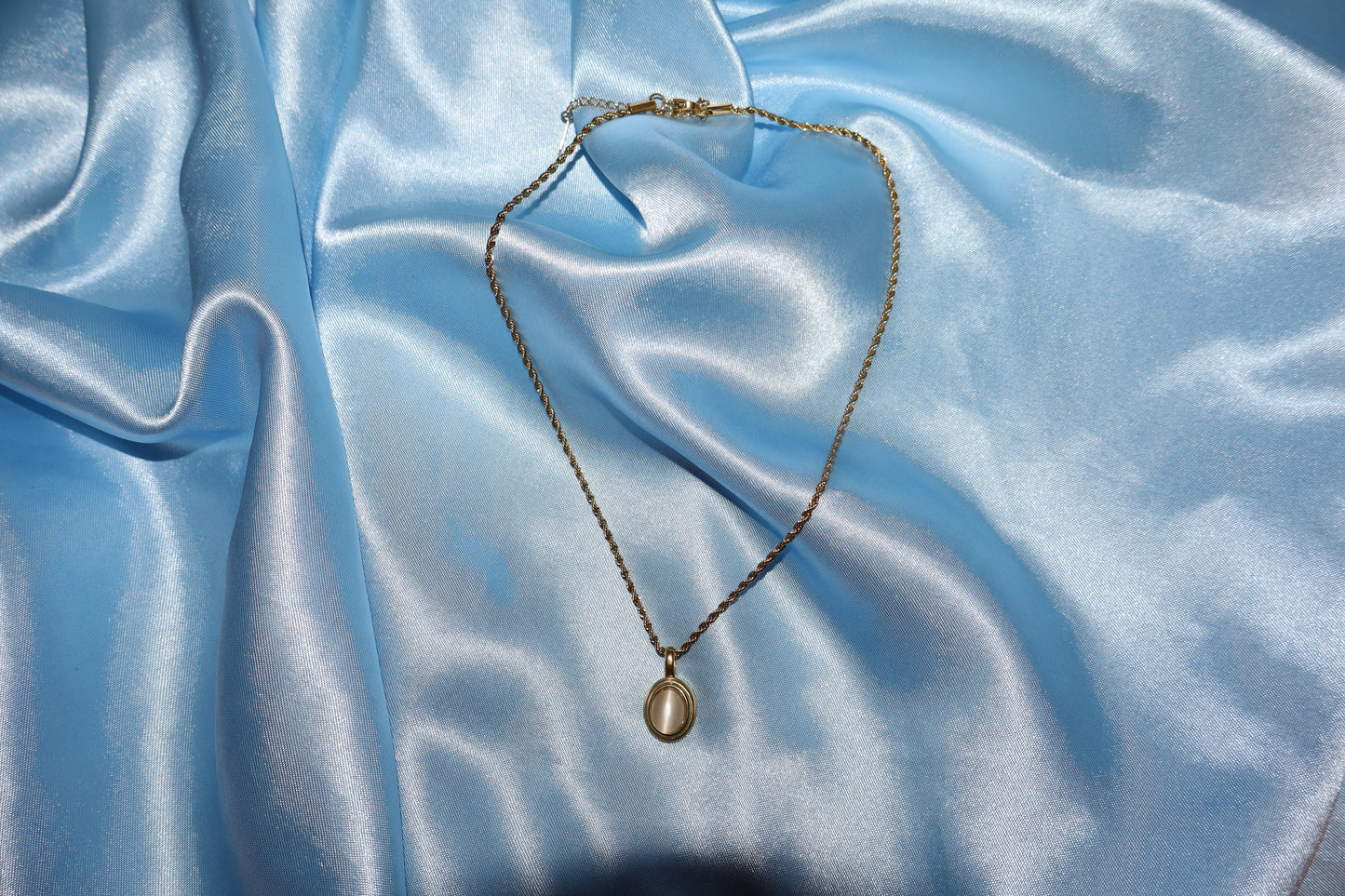 white stone pendant gold necklace