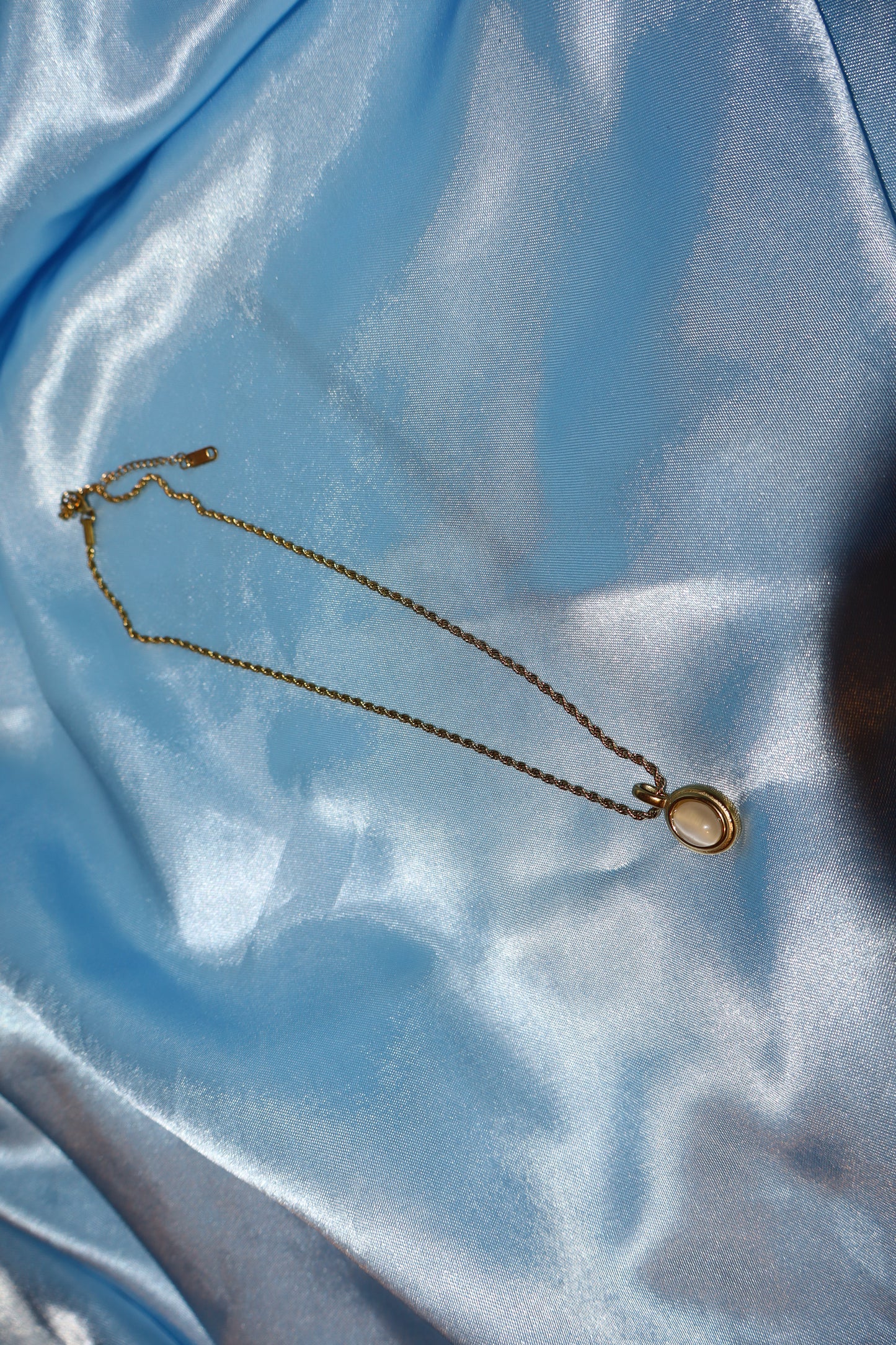 white stone pendant gold necklace