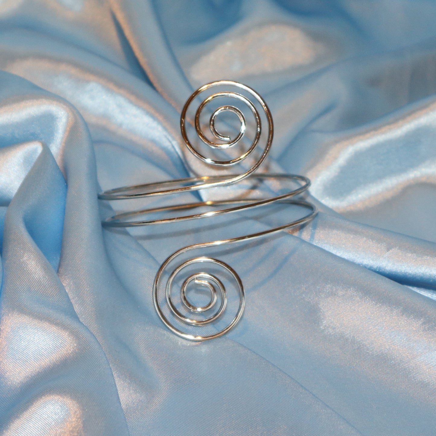 double swirl arm cuff silver