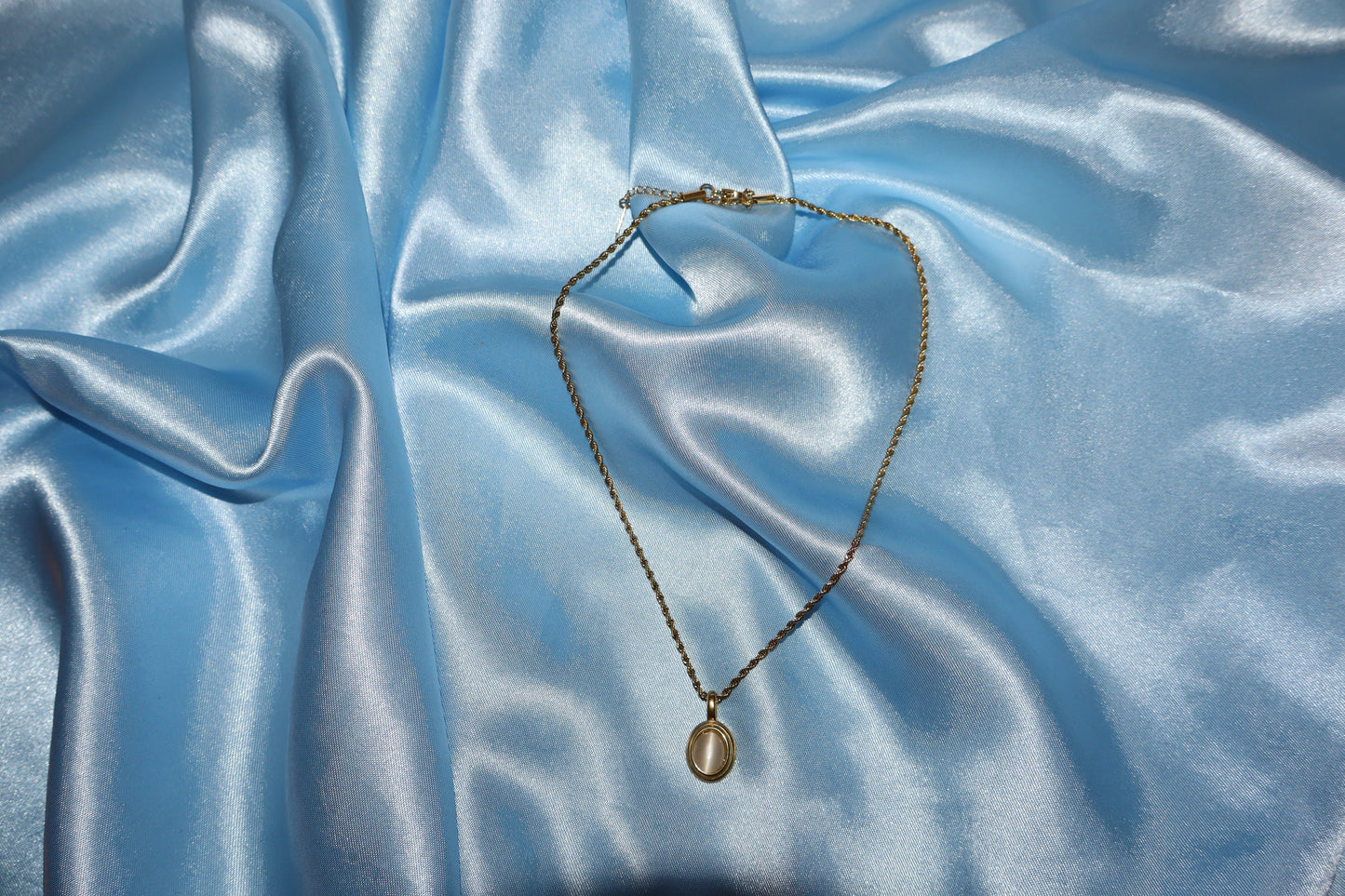 white stone pendant gold necklace