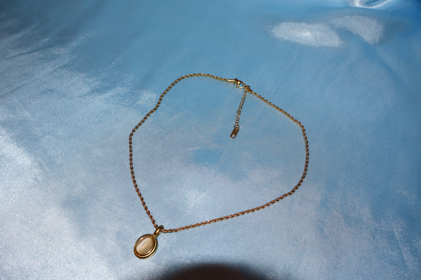 white stone pendant gold necklace