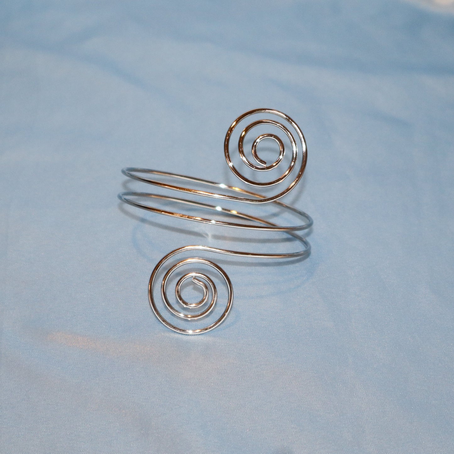 double swirl arm cuff silver