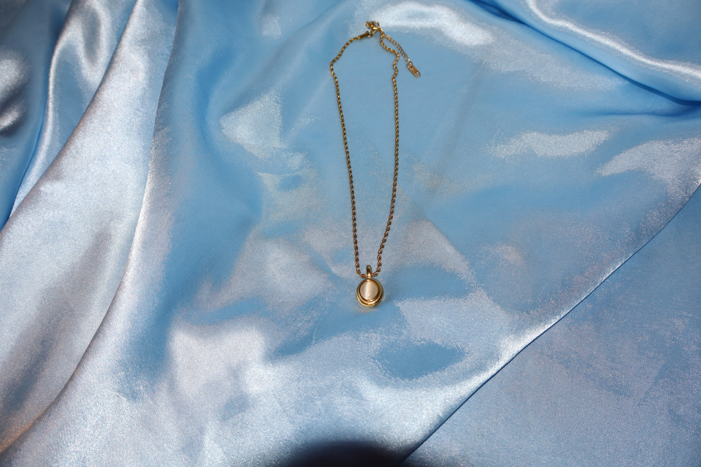 white stone pendant gold necklace