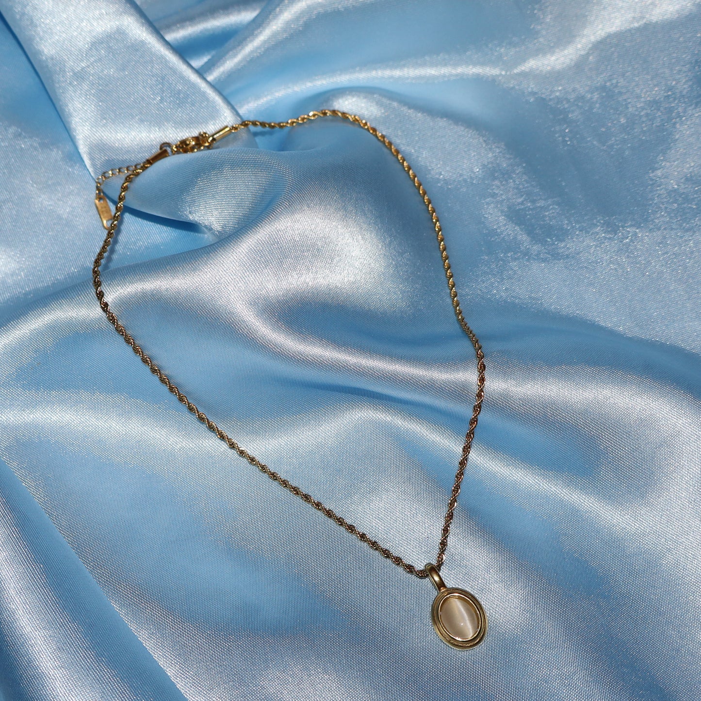 white stone pendant gold necklace