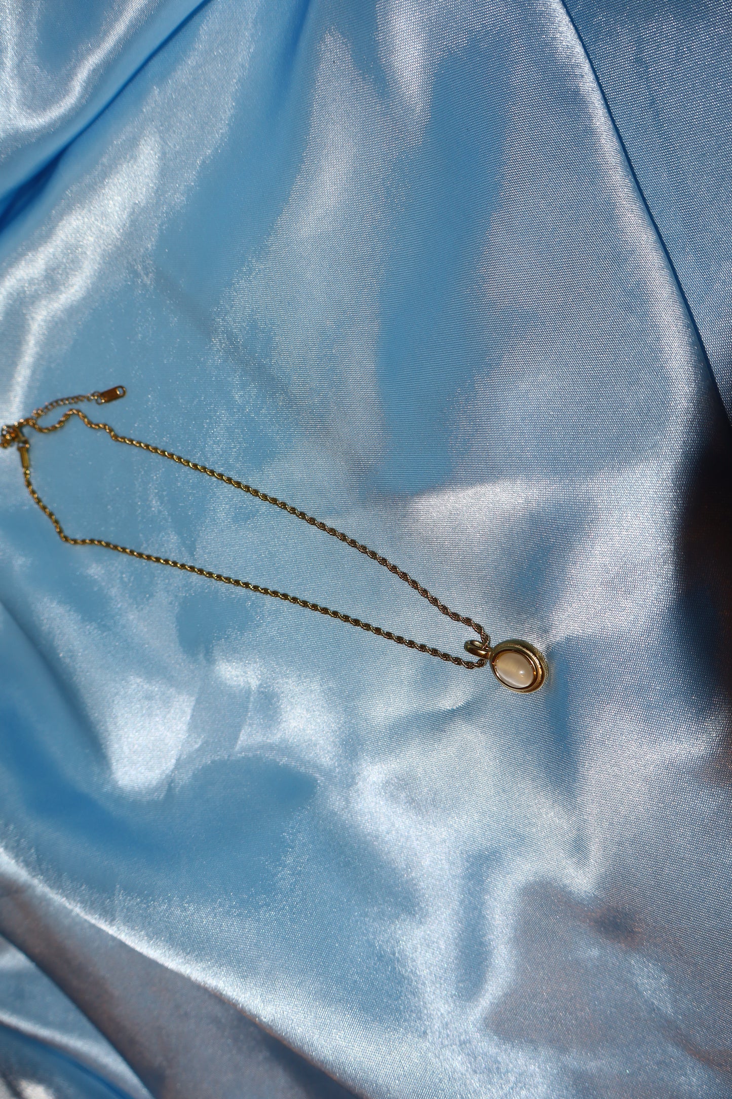 white stone pendant gold necklace