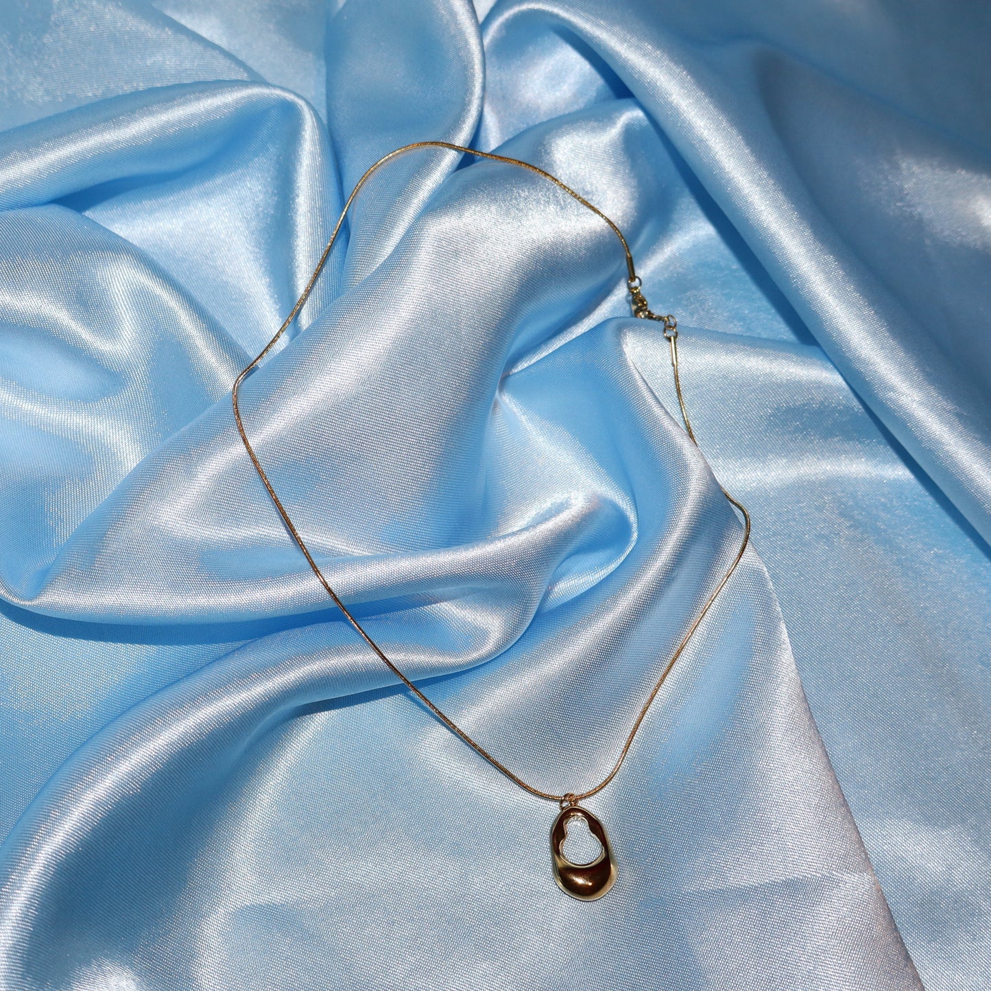 gold open oval necklace