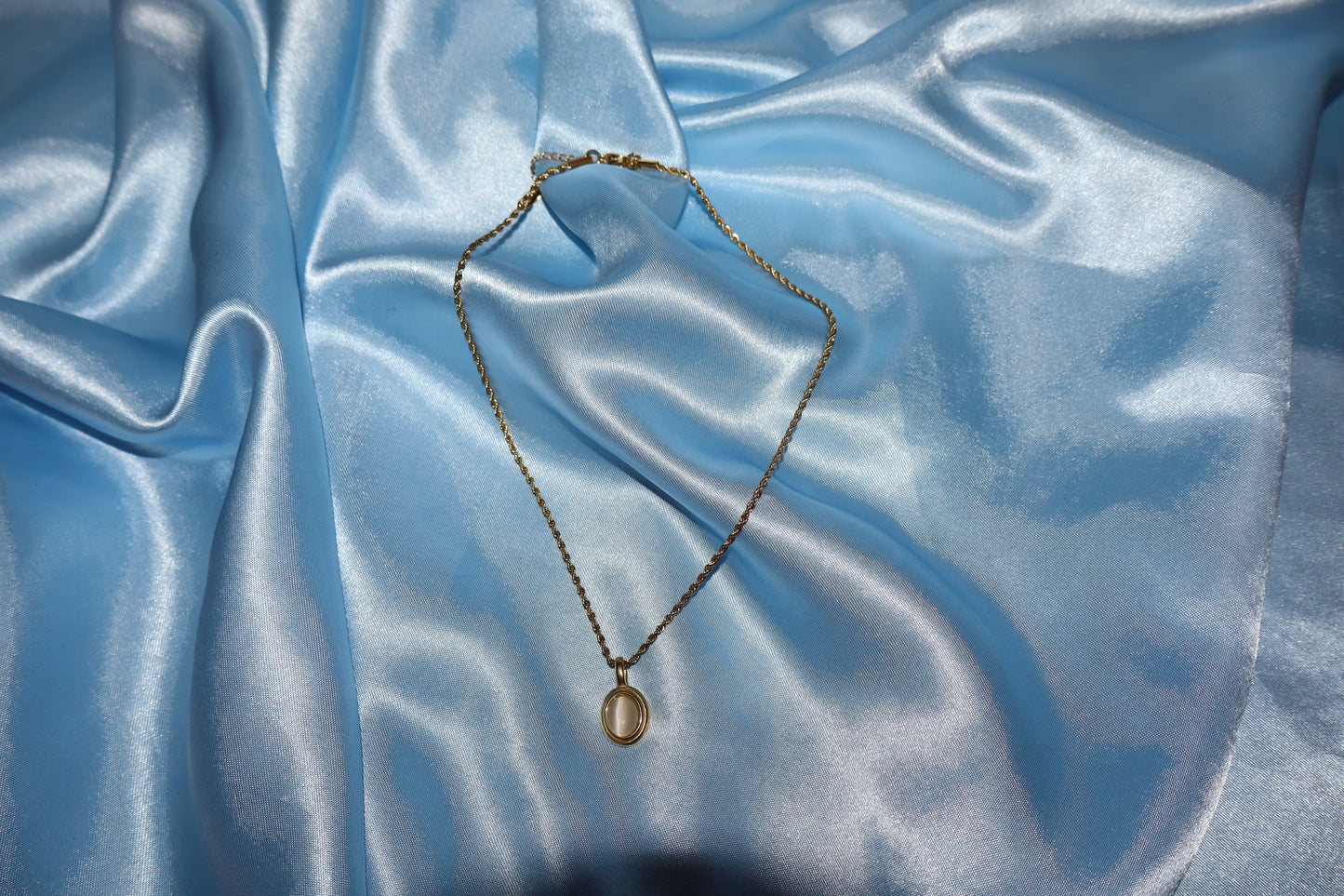 white stone pendant gold necklace