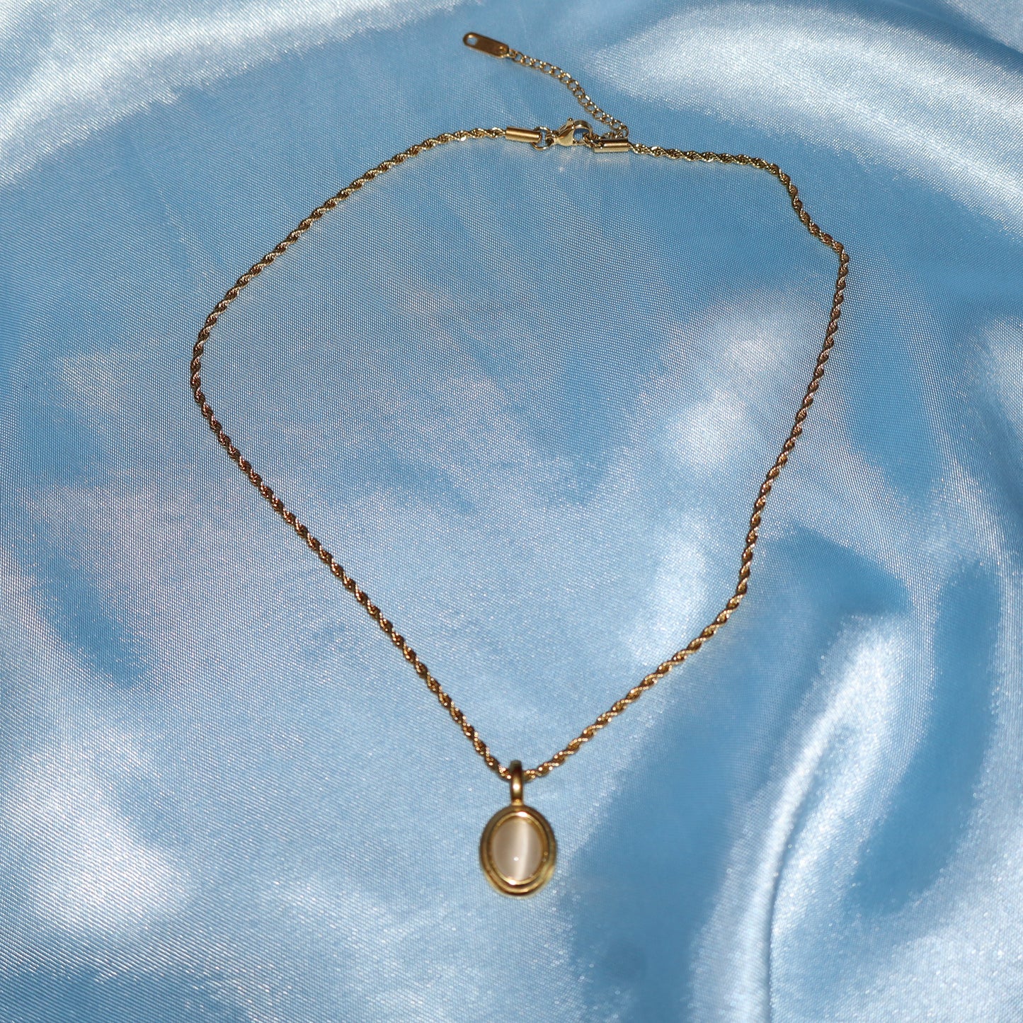 white stone pendant gold necklace