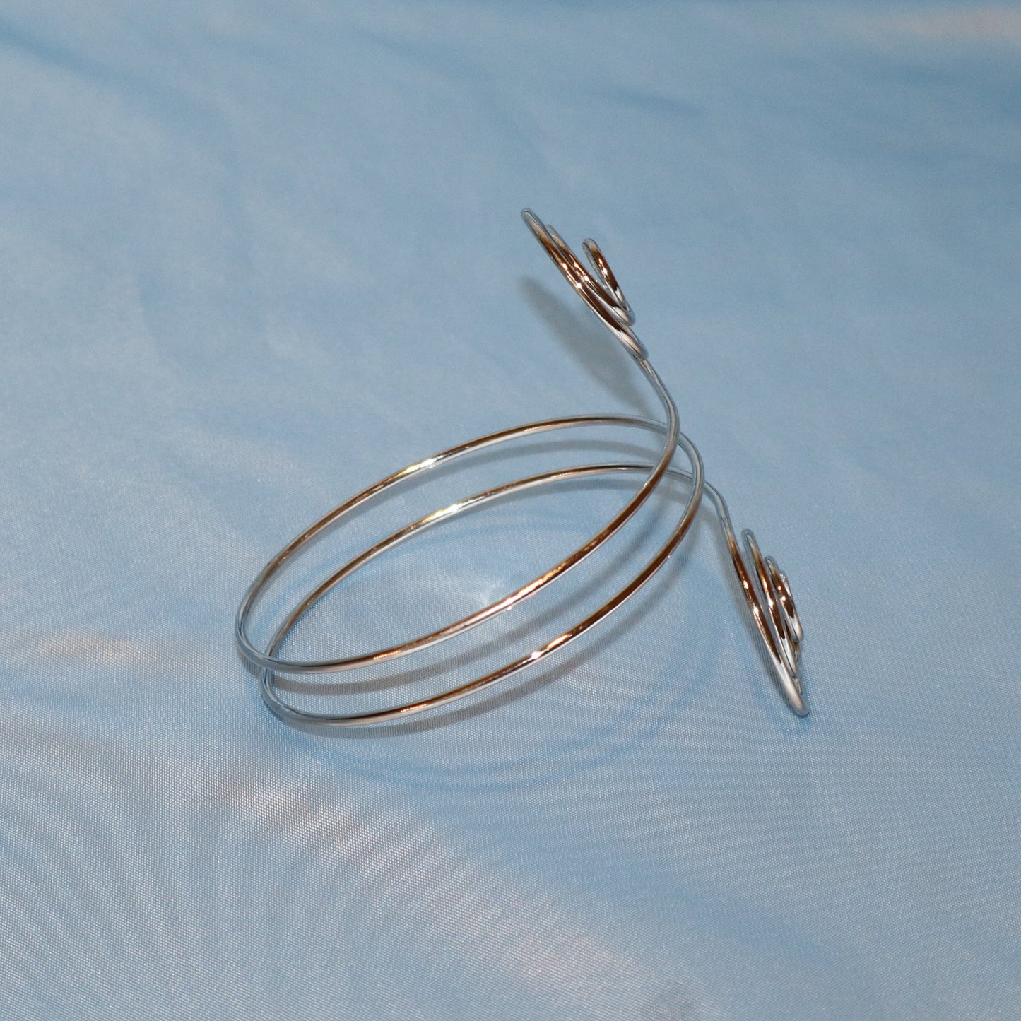 double swirl arm cuff silver