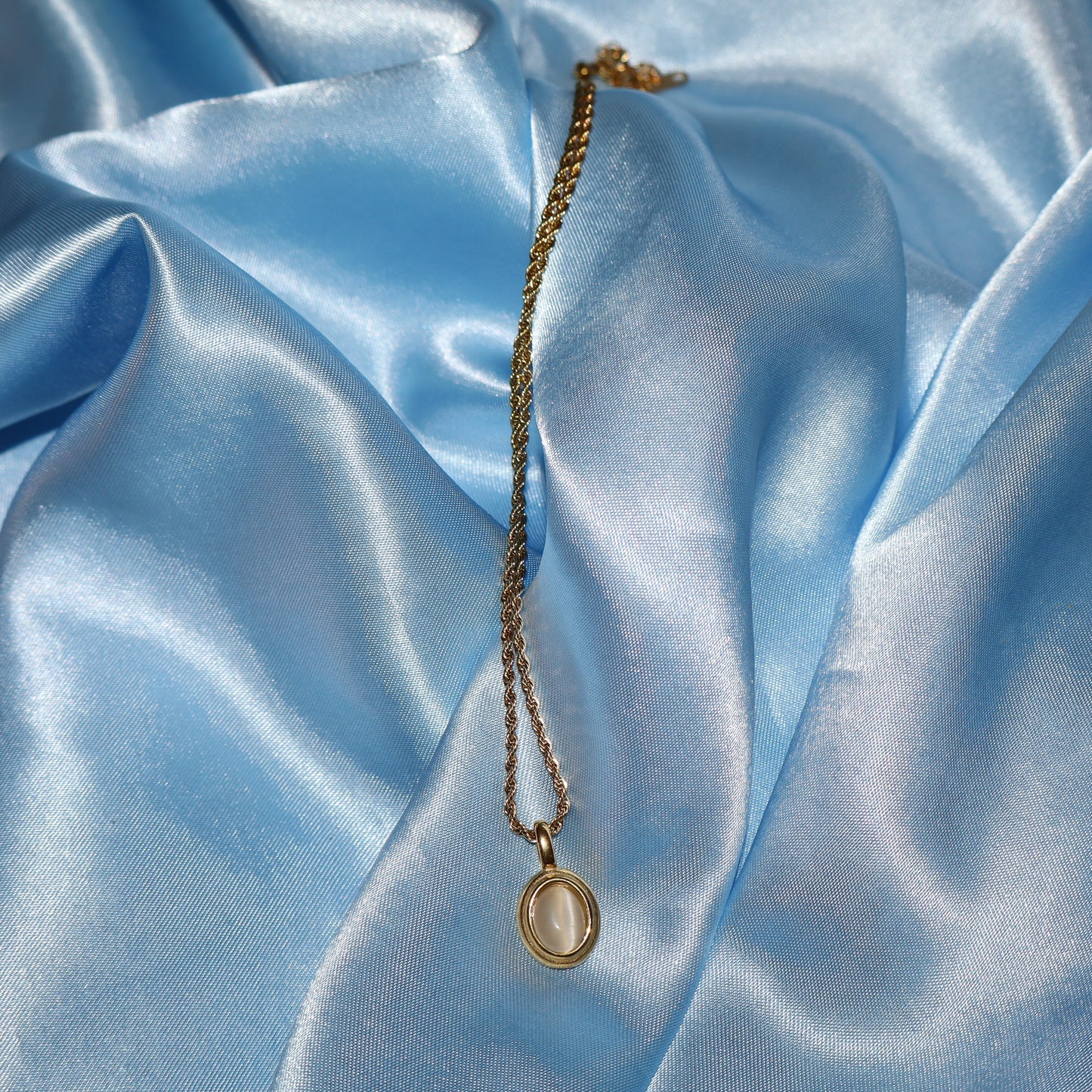 white stone pendant gold necklace