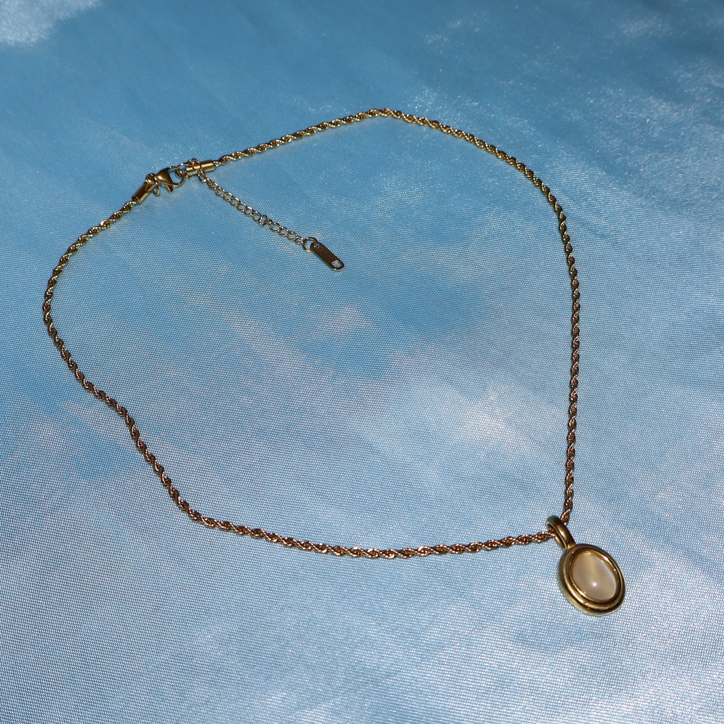 white stone pendant gold necklace