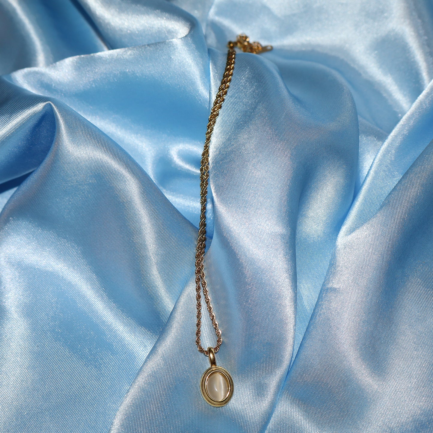 white stone pendant gold necklace