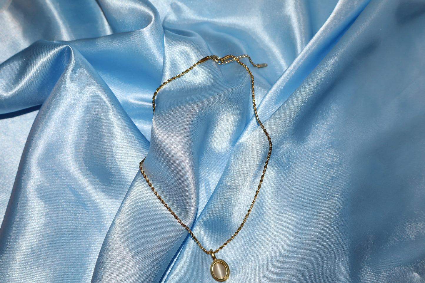 white stone pendant gold necklace