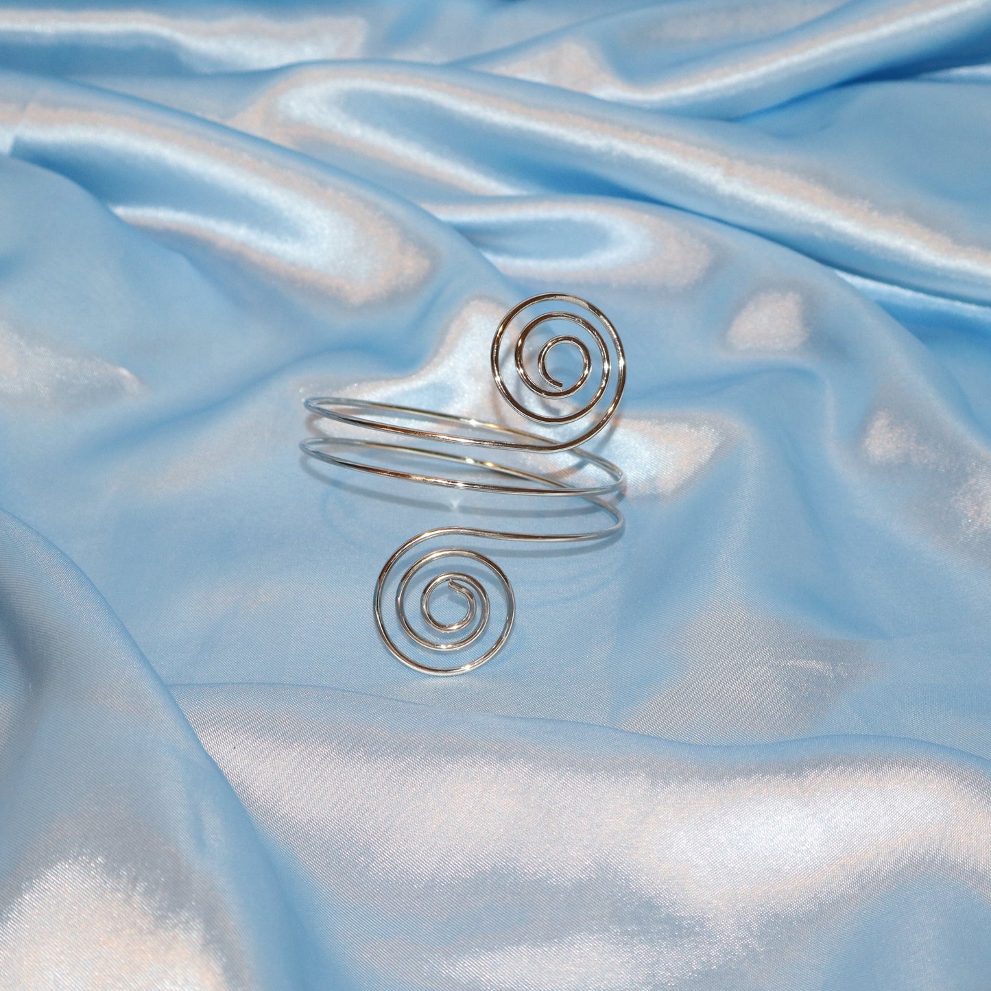 double swirl arm cuff silver