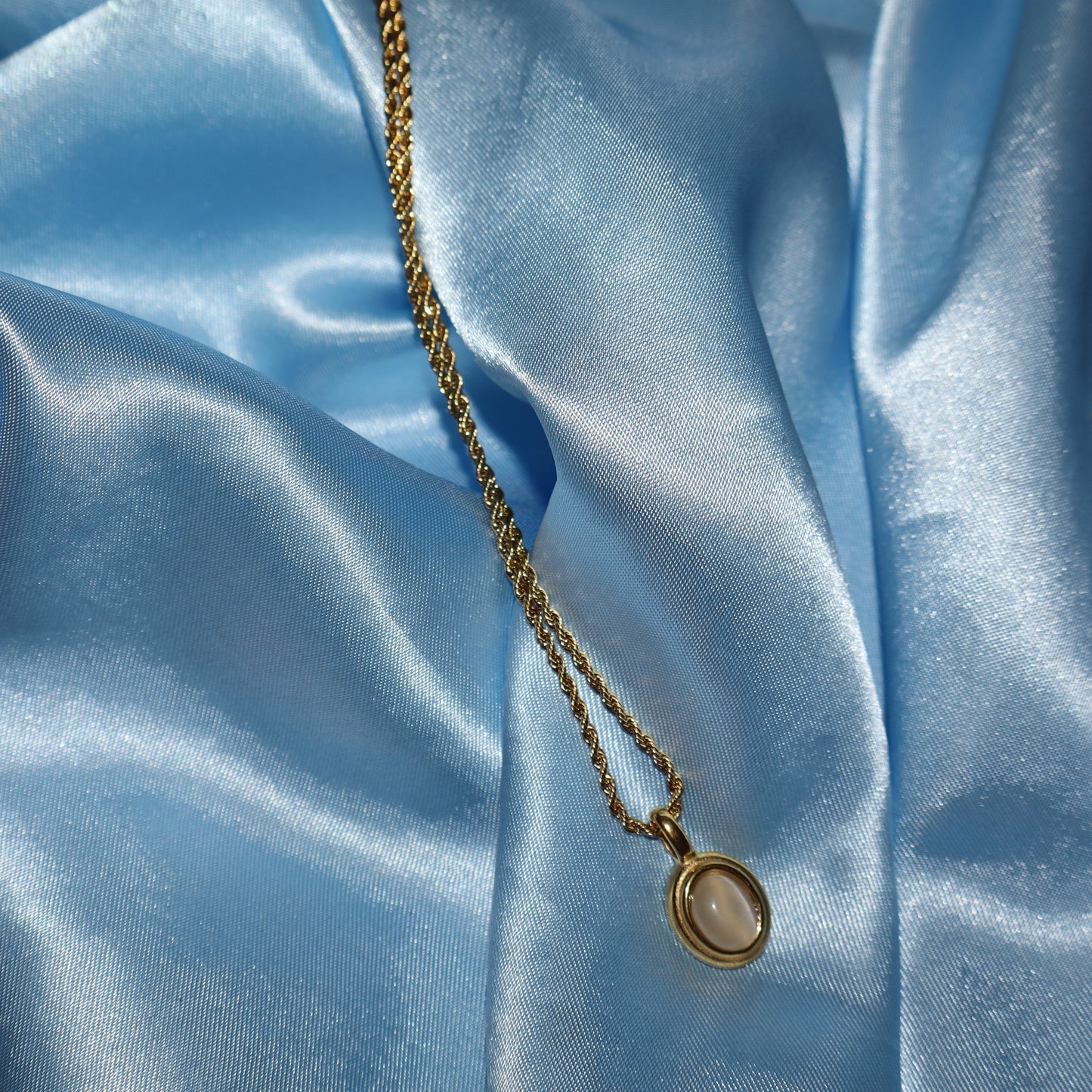 white stone pendant gold necklace