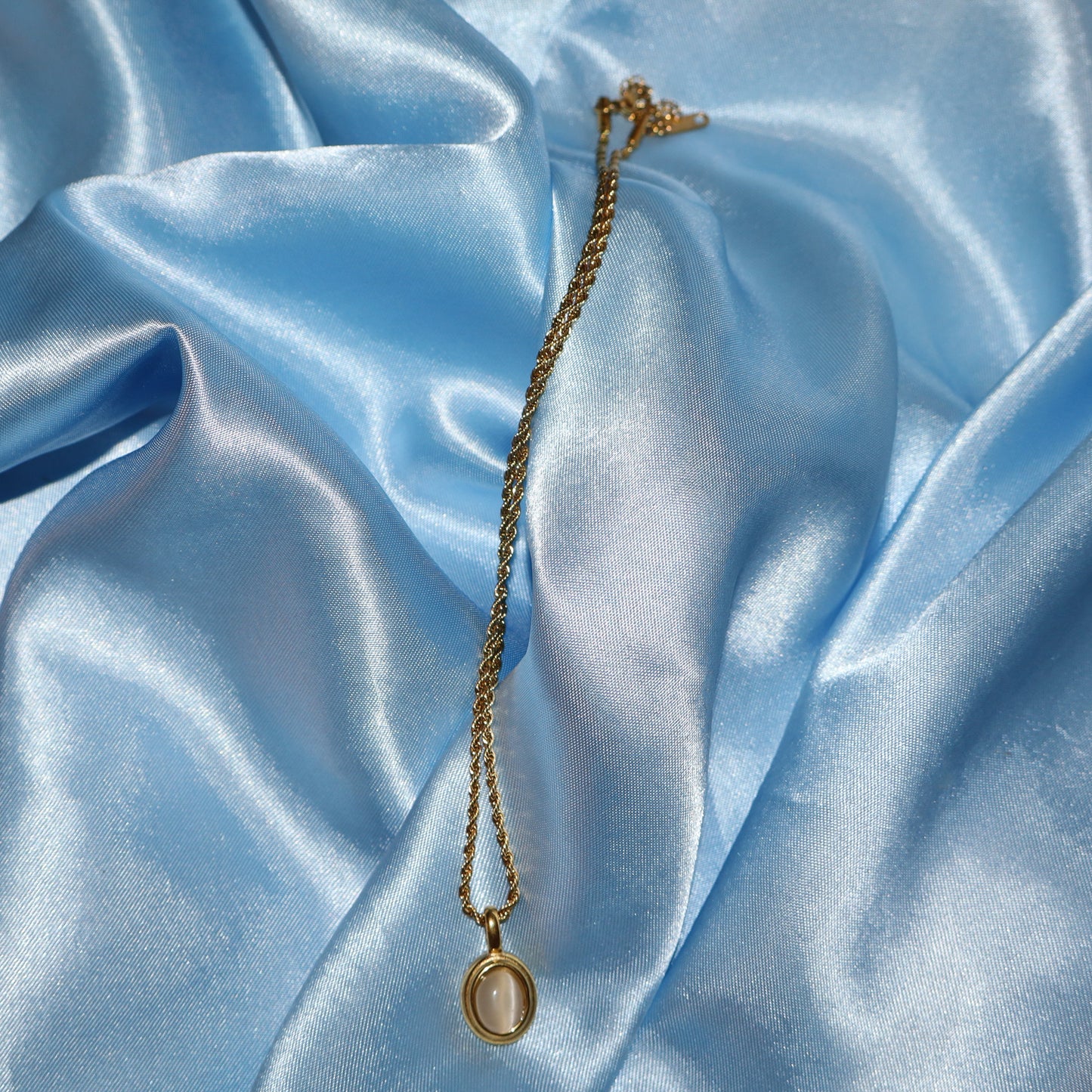 white stone pendant gold necklace