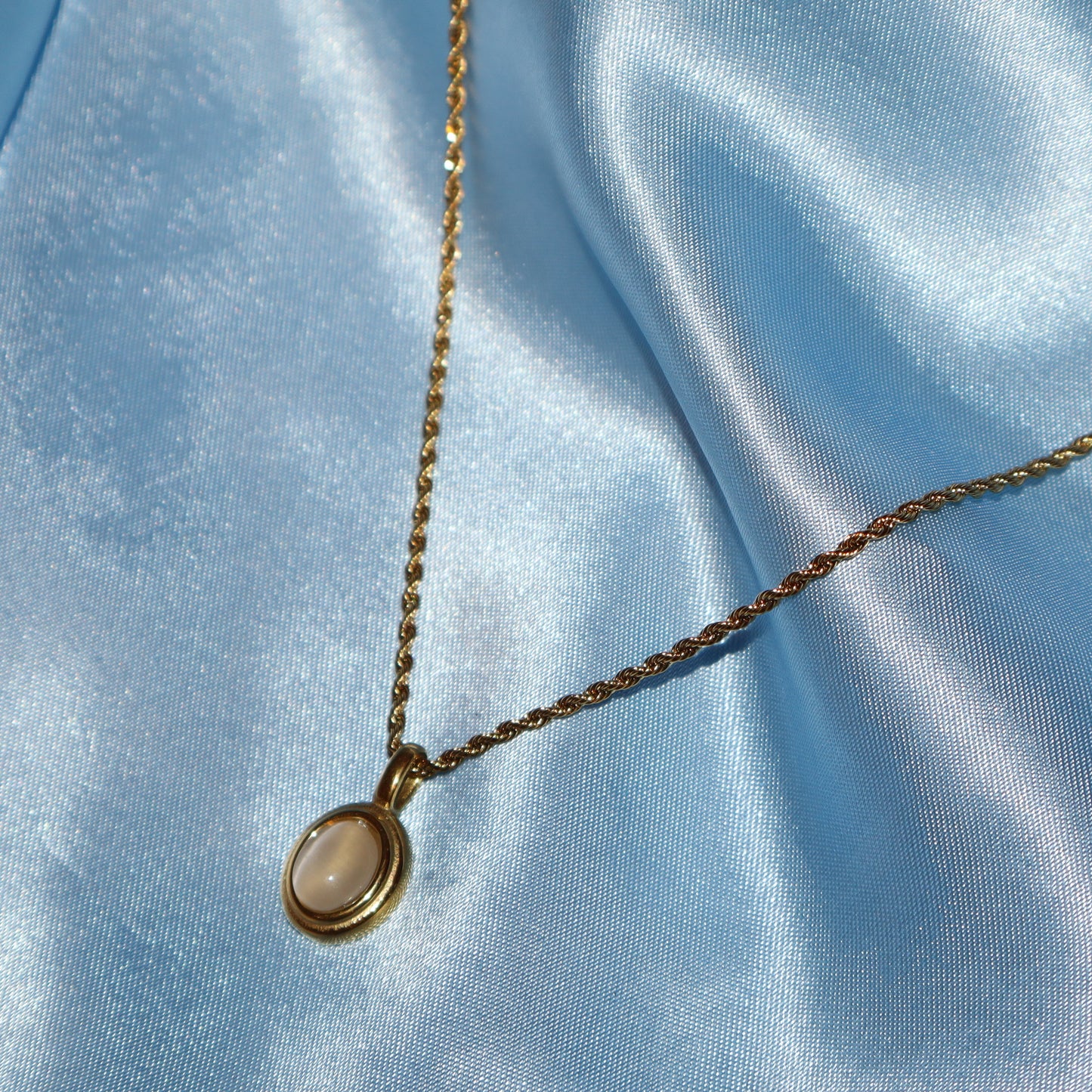 white stone pendant gold necklace