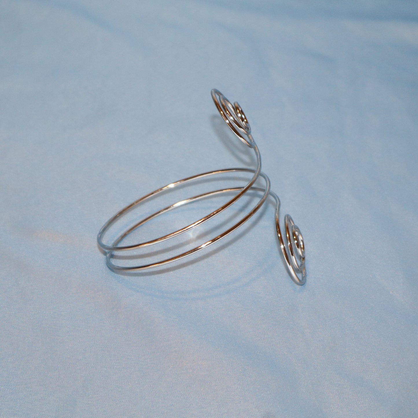 double swirl arm cuff silver