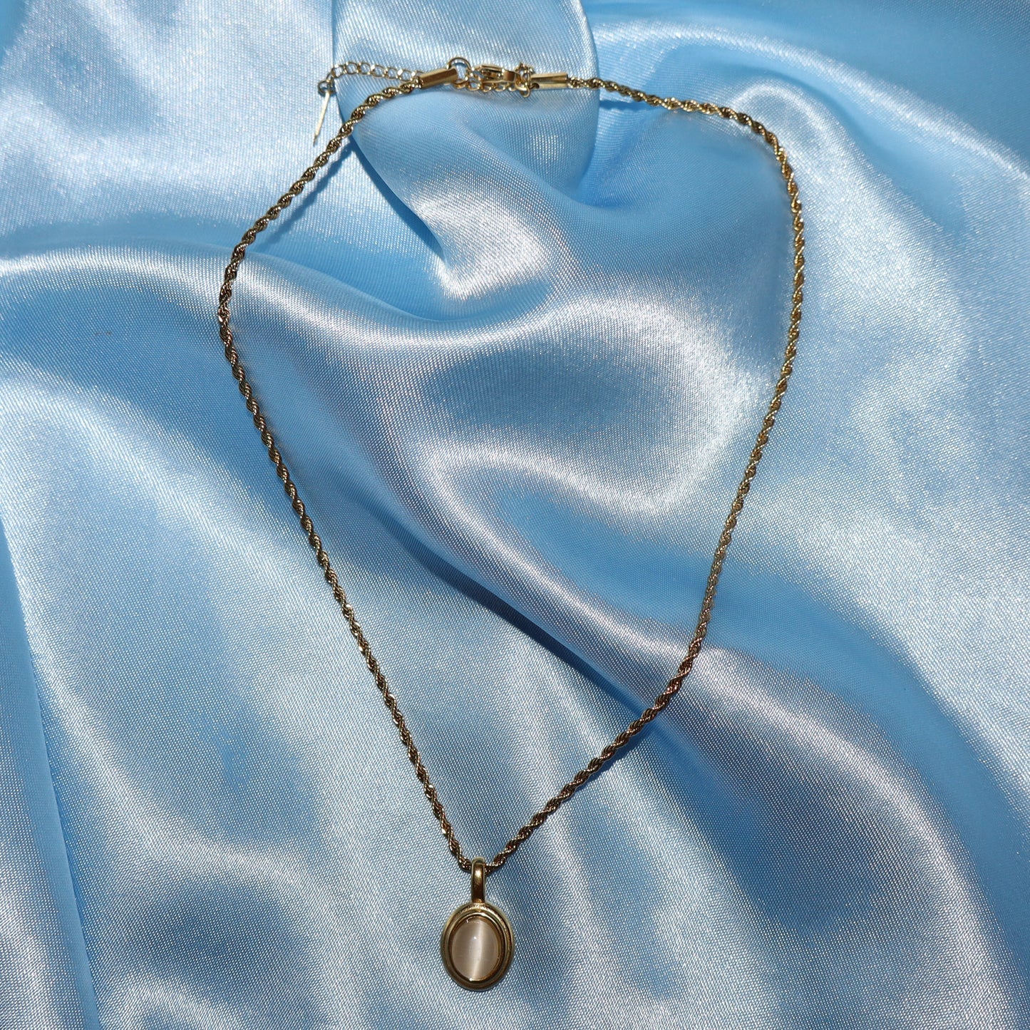 white stone pendant gold necklace