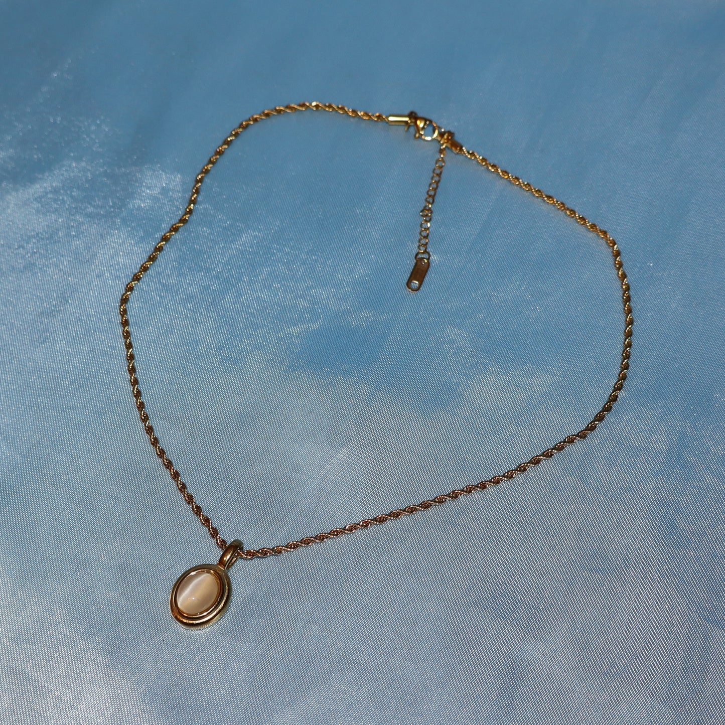 white stone pendant gold necklace