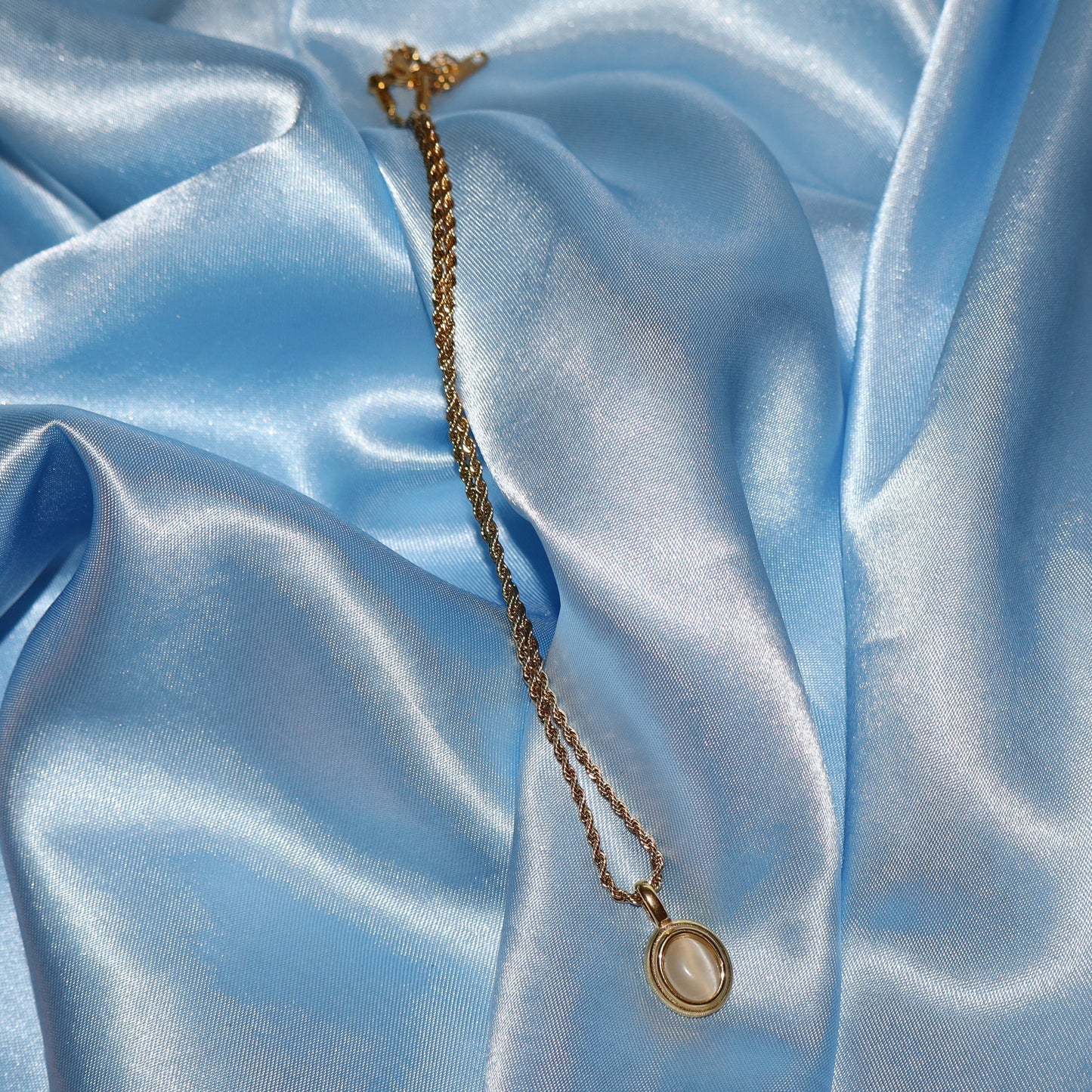 white stone pendant gold necklace