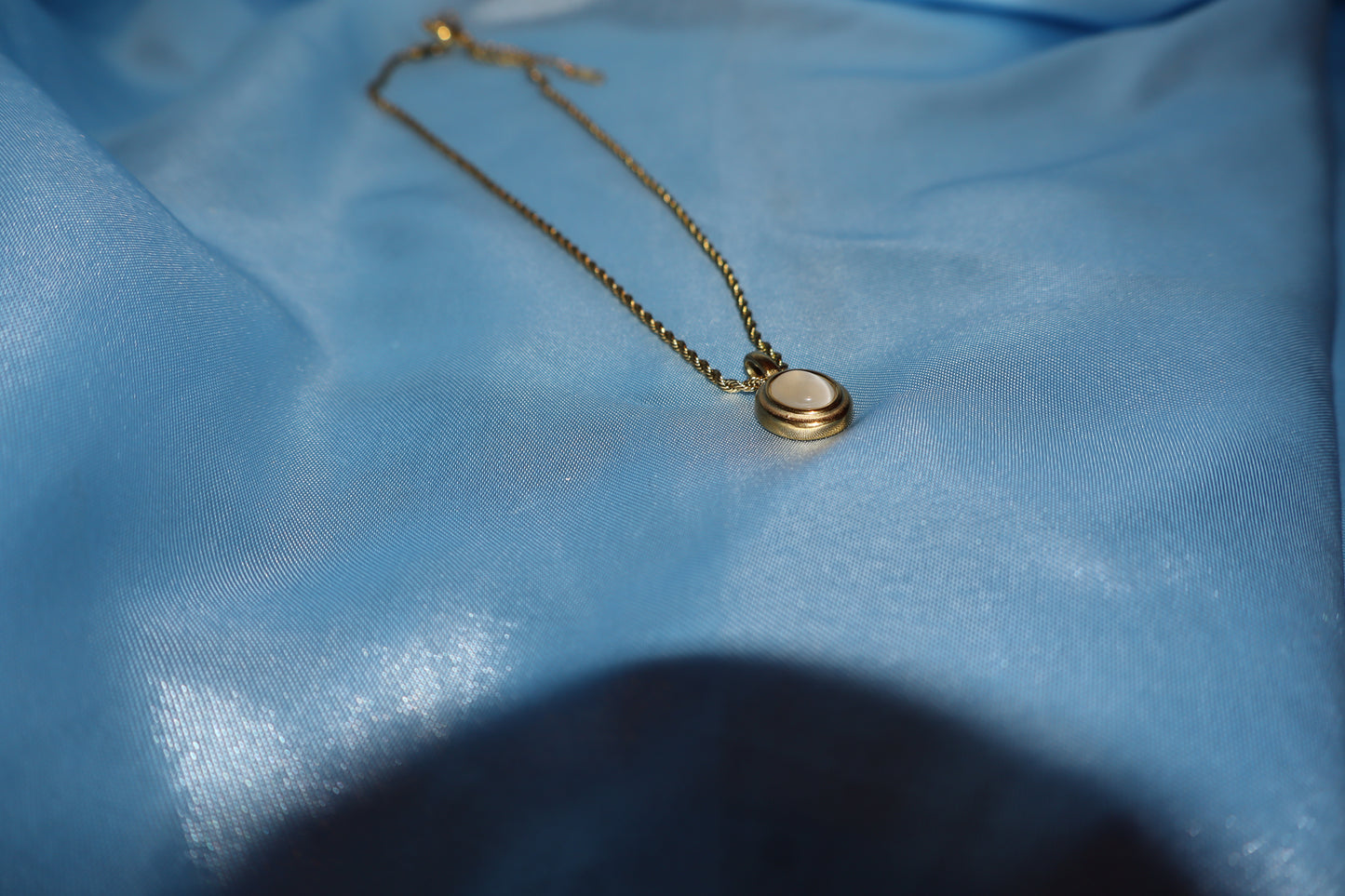 white stone pendant gold necklace